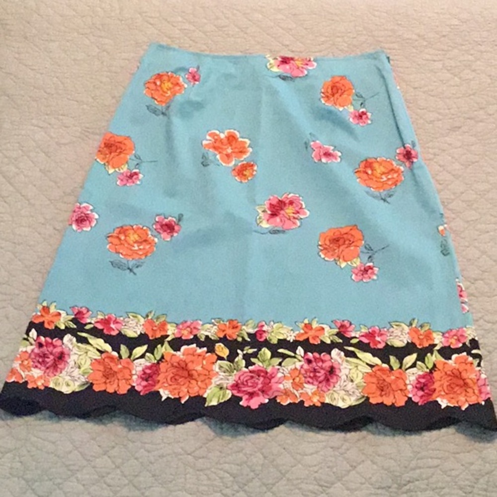 Harold’s A-line scalloped-edge skirt.